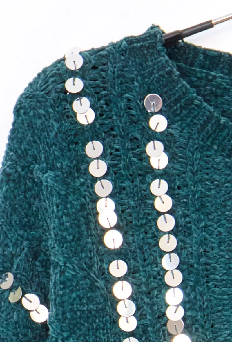 Langarmpullover mit Strasssteinen